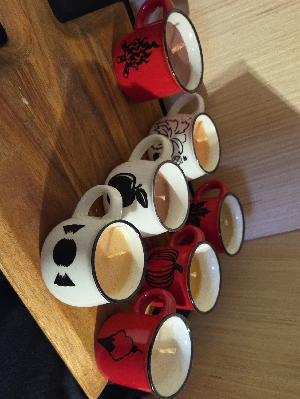 Set Of Seven Small Cup Candles